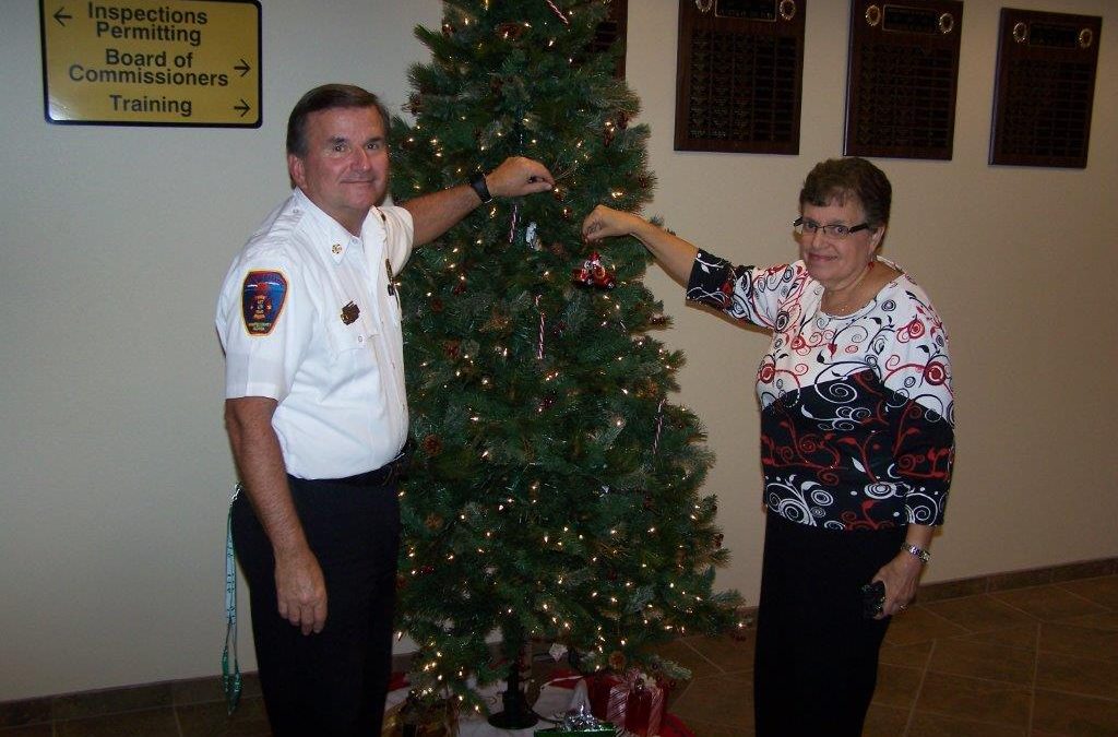 District Receives Donation of Fire Department Christmas Ornaments for Fire Administration Christmas Tree